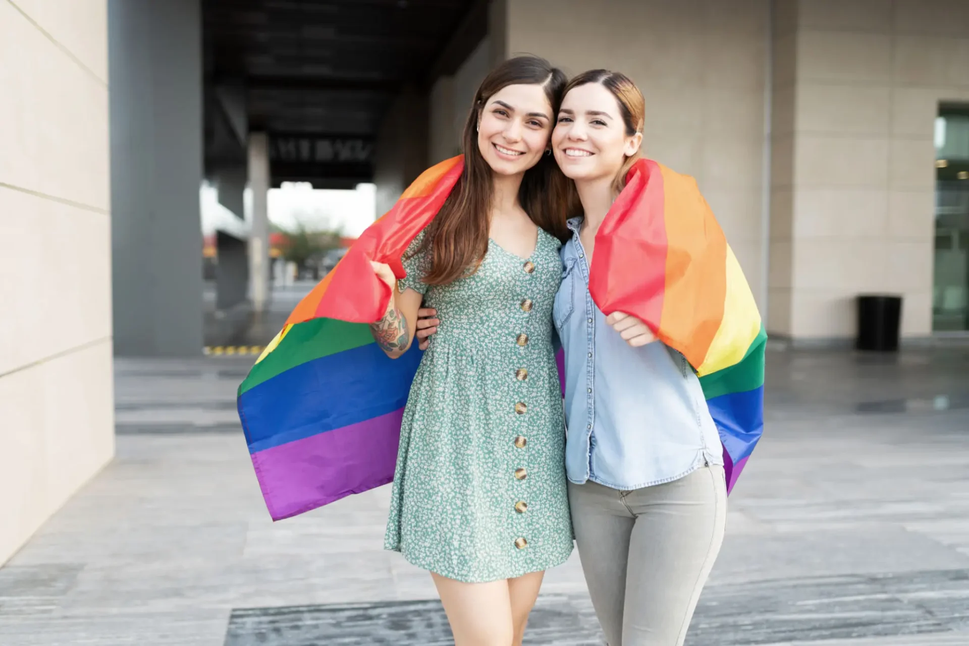 Women celebrating LGBTQ+ pride outdoors